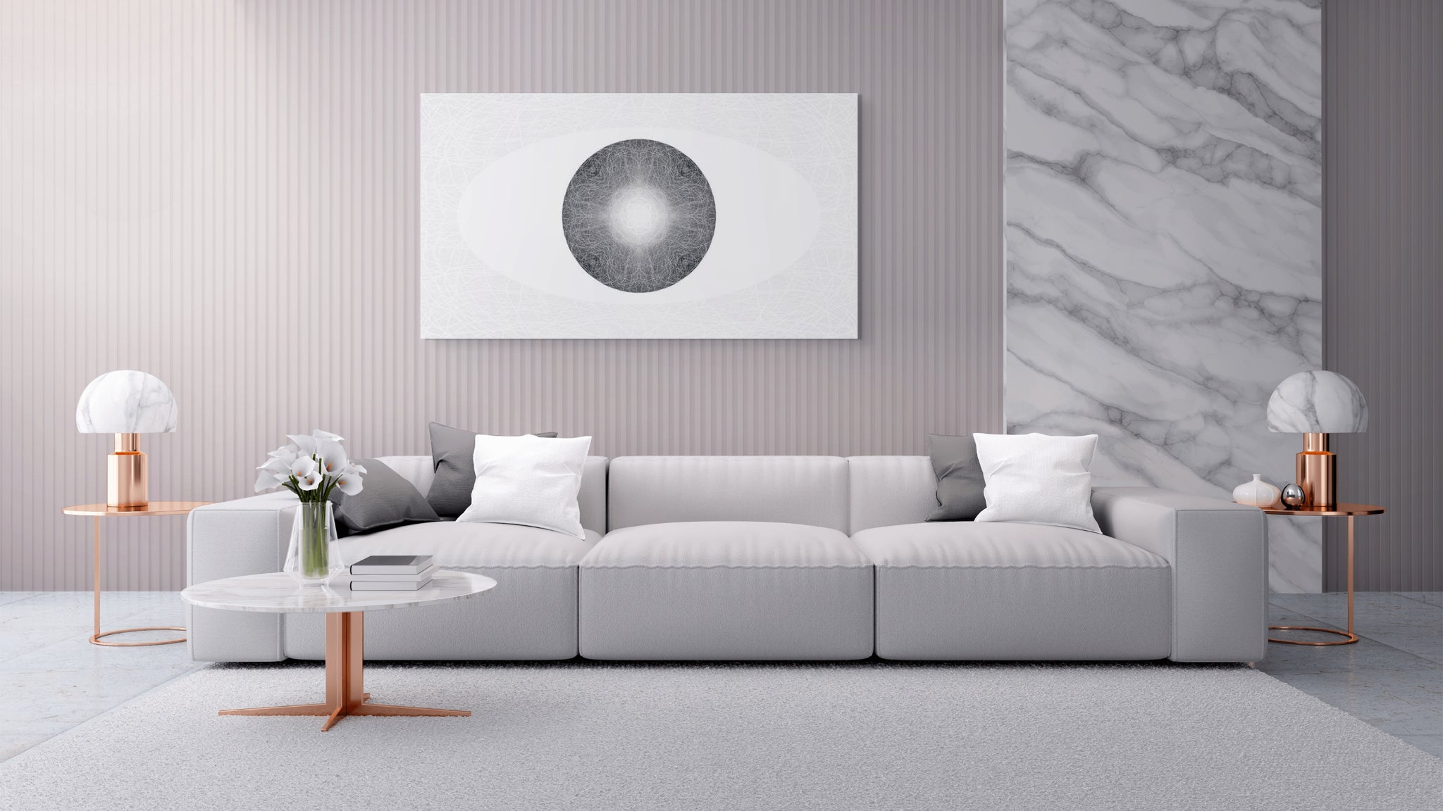 A modern living room scene featuring a light grey sofa with white and gray pillows, a round white coffee table with a copper-toned stand, two matching table lamps, and a large abstract circular wall art piece hanging above the sofa.